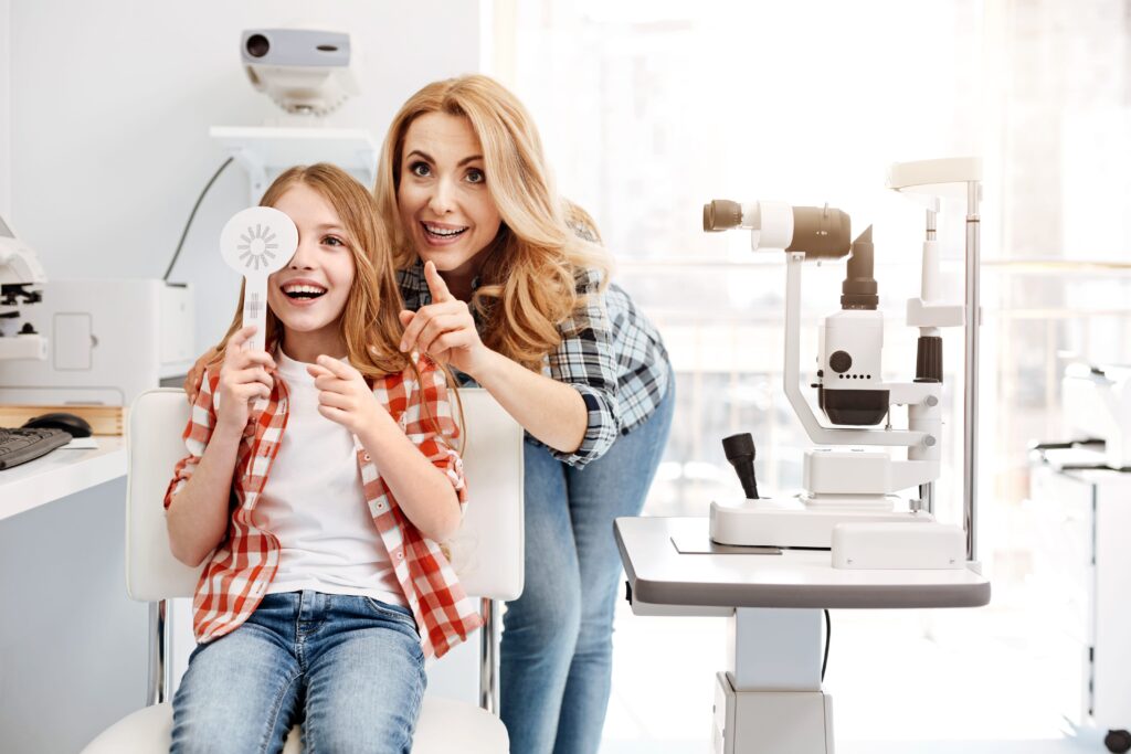 Parent and child smiling after pediatric eye exam near Bridgwater